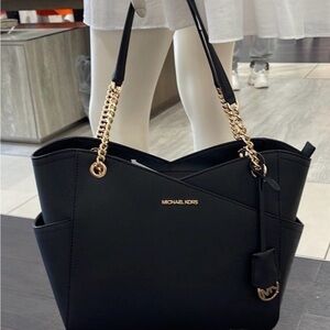 Michael Kors Black with gold chains Jet Set Bag